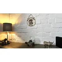 Welcome to our home with a Rottweiler plaque / sign