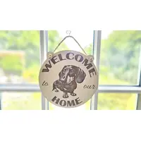 Welcome to our Home with an image of a Dachshund Hanging Wall Plaque / Sign