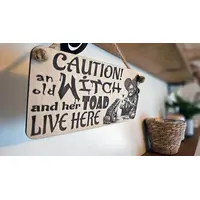Caution An Old Witch And Her Toad Live Here Decorative Sign | Plaque
