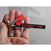 MARRY ME Keyring with Heart Motif and Red Tassle