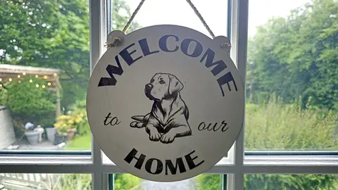 Welcome to our Home with an image of a Labrador Hanging Wall Plaque / Sign