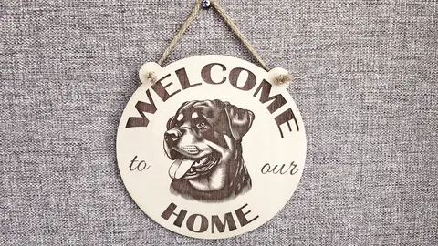 Welcome to our home with a Rottweiler plaque / sign