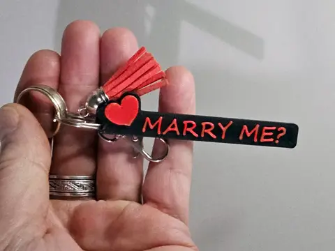 MARRY ME Keyring with Heart Motif and Red Tassle